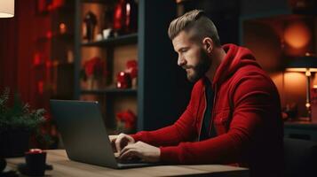 Attractive man shopping online for Christmas gifts. Festive atmosphere. photo