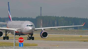 MOSCOW, RUSSIAN FEDERATION JULY 29, 2021 - Airbus A330 of Aeroflot airlines taxis after landing at Sheremetyevo International Airport, Moscow SVO. Tourism and travel concept. Modern aviation video