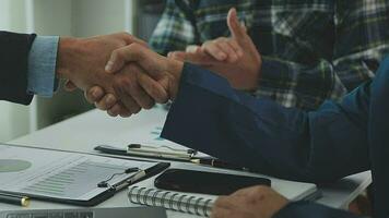 Team of business people working together in the meeting room office, teamwork background charts and graphs banner, double exposure successful teamwork,business planning concept. video