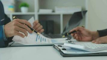 Team of business people working together in the meeting room office, teamwork background charts and graphs banner, double exposure successful teamwork,business planning concept. video
