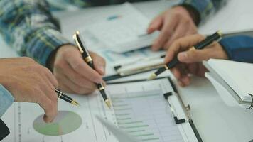 Team of business people working together in the meeting room office, teamwork background charts and graphs banner, double exposure successful teamwork,business planning concept. video