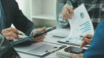 Team of business people working together in the meeting room office, teamwork background charts and graphs banner, double exposure successful teamwork,business planning concept. video