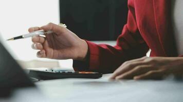 Financial Business team present. Business man hands hold documents with financial statistic stock photo, discussion, and analysis report data the charts and graphs. Finance Financial concept video