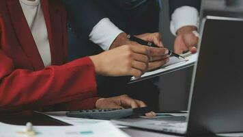 Financial Business team present. Business man hands hold documents with financial statistic stock photo, discussion, and analysis report data the charts and graphs. Finance Financial concept video