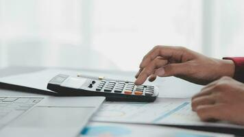 Financial Business team present. Business man hands hold documents with financial statistic stock photo, discussion, and analysis report data the charts and graphs. Finance Financial concept video
