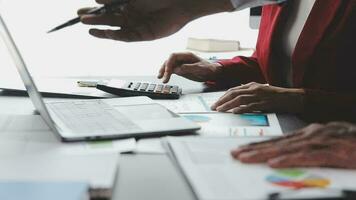 Financial Business team present. Business man hands hold documents with financial statistic stock photo, discussion, and analysis report data the charts and graphs. Finance Financial concept video