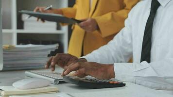 Financial Business team present. Business man hands hold documents with financial statistic stock photo, discussion, and analysis report data the charts and graphs. Finance Financial concept video