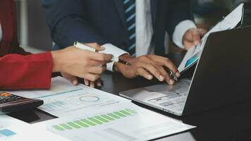 Financial Business team present. Business man hands hold documents with financial statistic stock photo, discussion, and analysis report data the charts and graphs. Finance Financial concept video