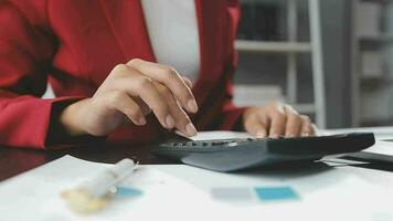Financial Business team present. Business man hands hold documents with financial statistic stock photo, discussion, and analysis report data the charts and graphs. Finance Financial concept video