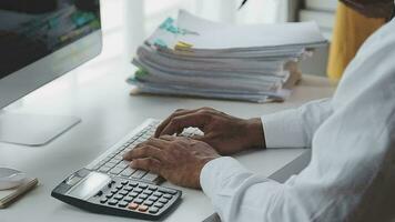 Financial Business team present. Business man hands hold documents with financial statistic stock photo, discussion, and analysis report data the charts and graphs. Finance Financial concept video