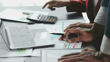 Financial Business team present. Business man hands hold documents with financial statistic stock photo, discussion, and analysis report data the charts and graphs. Finance Financial concept video
