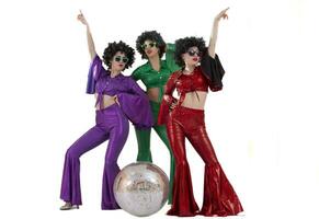 Group of girls amazed in disco style, with disco ball, halloween party, on white background. photo