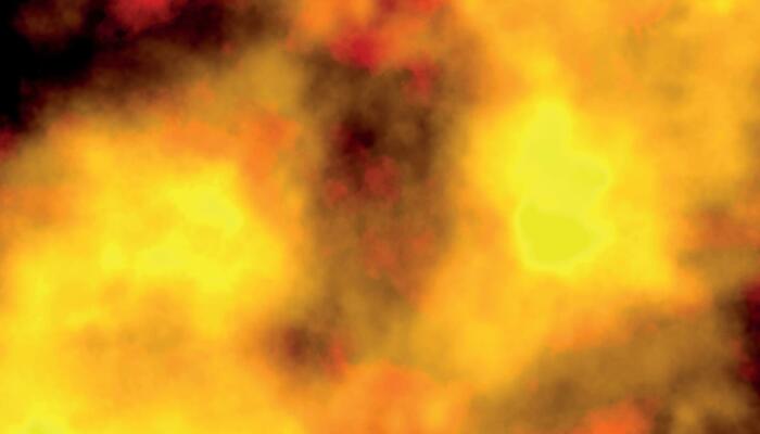 fire background. fire grunge textured stone wall background. burning coals and cracked surfaces.