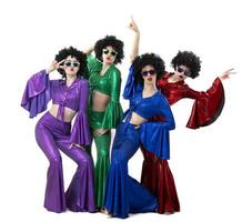 Disco style girls in colorful flared suits and African American wigs on a white background. Seventies or eighties style. photo