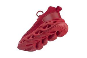 Flying red rag sneaker with a corrugated sole on a white background. Sport shoes. photo