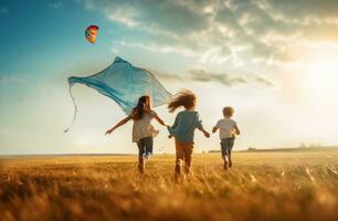 People are running through the field with a kite flying in the wind photo