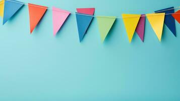 Colorful pennants on the minimalist vivid background photo