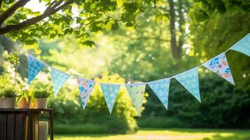 Colorful bunting at the party with trees behind it photo