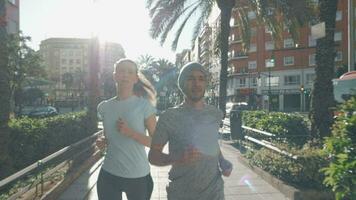 Young couple on morning jog video