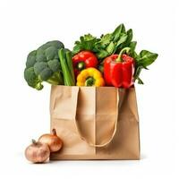 Fresh vegetables in paper bag isolated photo