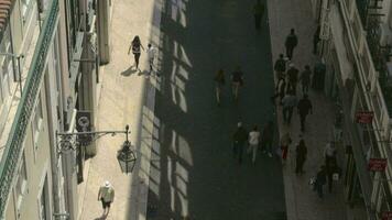 Busy pedestrian street Rua do Carmo viewed from santa Justa Lift in Lisbon video