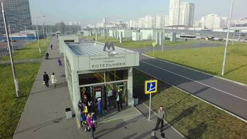 Aerial shot of people traffic at Kotelniki subway station entry, Moscow video
