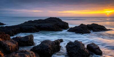 mágico puesta de sol verano paisaje en el playa por escénico rocas primer plano. ai generativo foto