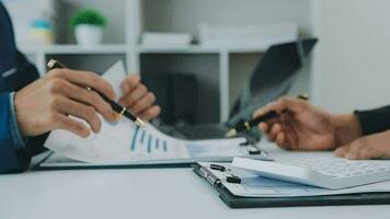 Team of business people working together in the meeting room office, teamwork background charts and graphs banner, double exposure successful teamwork,business planning concept. video
