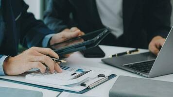 Team of business people working together in the meeting room office, teamwork background charts and graphs banner, double exposure successful teamwork,business planning concept. video
