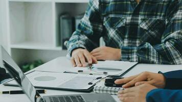 Team of business people working together in the meeting room office, teamwork background charts and graphs banner, double exposure successful teamwork,business planning concept. video