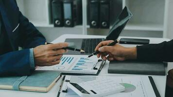 Team of business people working together in the meeting room office, teamwork background charts and graphs banner, double exposure successful teamwork,business planning concept. video
