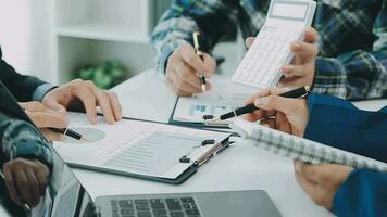Team of business people working together in the meeting room office, teamwork background charts and graphs banner, double exposure successful teamwork,business planning concept. video