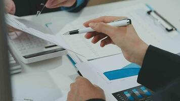 Close up of Business team analyzing income charts and graphs with modern laptop computer. Business analysis and strategy concept. video