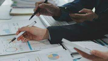 Close up of Business team analyzing income charts and graphs with modern laptop computer. Business analysis and strategy concept. video