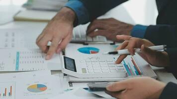 Close up of Business team analyzing income charts and graphs with modern laptop computer. Business analysis and strategy concept. video
