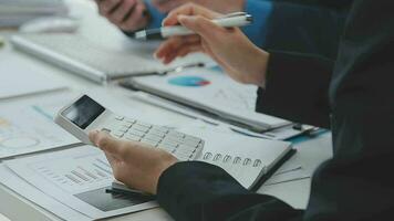 Close up of Business team analyzing income charts and graphs with modern laptop computer. Business analysis and strategy concept. video