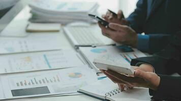 Close up of Business team analyzing income charts and graphs with modern laptop computer. Business analysis and strategy concept. video
