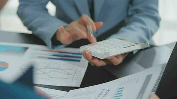 Close up of Business team analyzing income charts and graphs with modern laptop computer. Business analysis and strategy concept. video