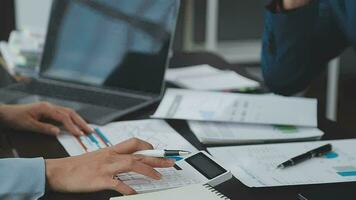 Close up of Business team analyzing income charts and graphs with modern laptop computer. Business analysis and strategy concept. video