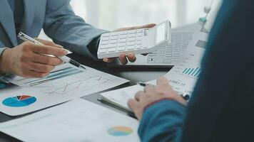 Close up of Business team analyzing income charts and graphs with modern laptop computer. Business analysis and strategy concept. video
