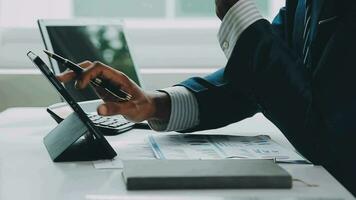 Close up of Business team analyzing income charts and graphs with modern laptop computer. Business analysis and strategy concept. video