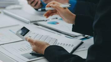 Close up of Business team analyzing income charts and graphs with modern laptop computer. Business analysis and strategy concept. video
