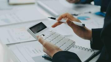 Close up of Business team analyzing income charts and graphs with modern laptop computer. Business analysis and strategy concept. video