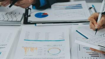 Close up of Business team analyzing income charts and graphs with modern laptop computer. Business analysis and strategy concept. video