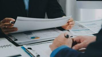 Close up of Business team analyzing income charts and graphs with modern laptop computer. Business analysis and strategy concept. video