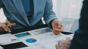 Close up of Business team analyzing income charts and graphs with modern laptop computer. Business analysis and strategy concept. video