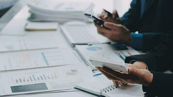 Close up of Business team analyzing income charts and graphs with modern laptop computer. Business analysis and strategy concept. video