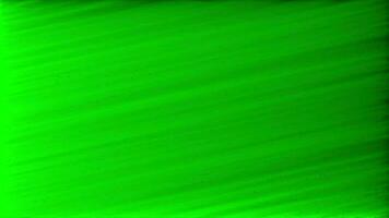 green abstract background with a black border video