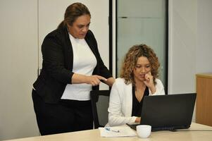 Maori, Pacific Islanders in business setting for meeting and coaching photo