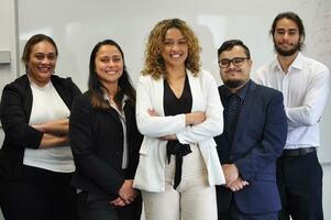 Maori, Pacific Islanders in business setting for meeting and coaching photo